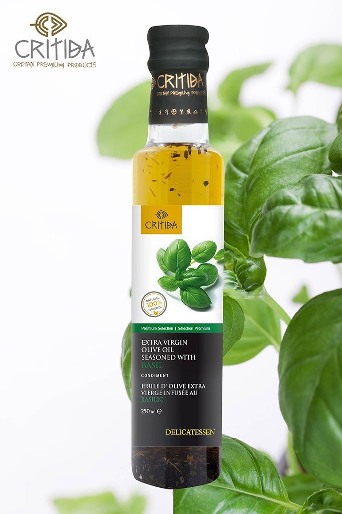 Fresh green Italian basil on a white background. Closeup, selective focus